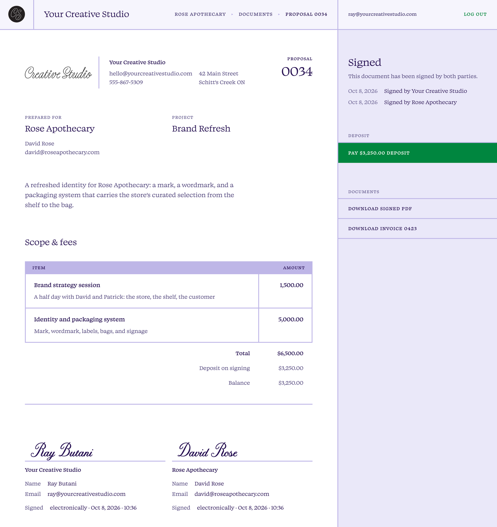 A proposal signed by the studio and its client, with the deposit ready to pay
